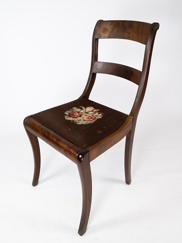Late empire chair of mahogany upholstered with black floral fabric from the 
1840s.
5000m2 showroom.
