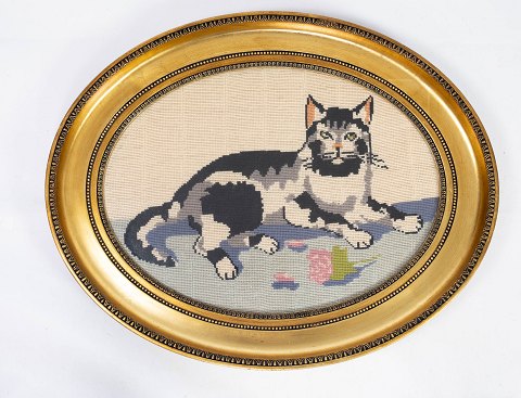 Embroidery with cat motif and with gilded frame from the 1930s. 
5000m2 showroom.
