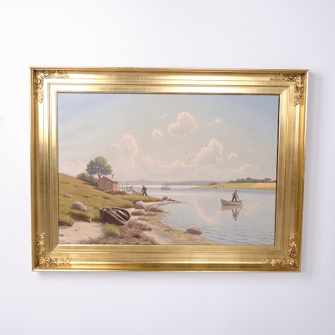 Peinture sur toile représentant une scène côtière avec des pêcheurs dans un cadre doré