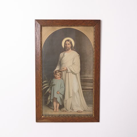 Estampe avec motif religieux dans un cadre en bois