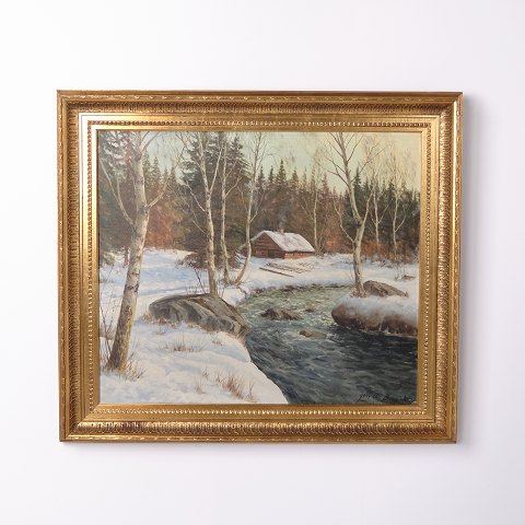 Peinture signée sur toile représentant un paysage enneigé, encadrée