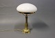 Tablelamp in brass with beautifully foot and White glass dome. 
