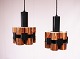 A pair of ceiling pendants in of cobber and black lacquered metal by Werner 
Schou from the 1960s.
