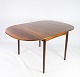 Dining table with extension in rosewood designed by Arne Vodder from the 1960s. 

