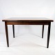 Dining table in rosewood with extentions, of danish design from the 1960s. 
5000m2 showroom.
