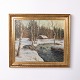 Peinture signée sur toile représentant un paysage enneigé, encadrée