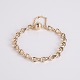 Bracelet en or Ole Lynggaard en or 14 carats avec maille iconique en forme de huit et fermoir d